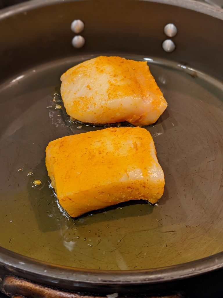 Fish Steaks searing in a pan